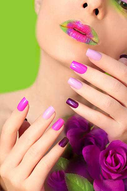 istock Colorful lilac manicure and lips. 531687654