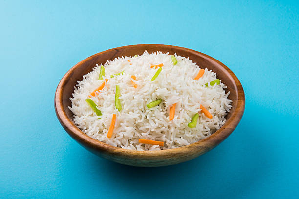 istock cooked white basmati rice with carrot and capsicum toppings 531688460