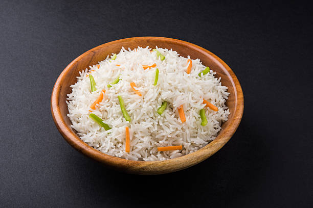istock cooked white basmati rice with carrot and capsicum toppings 531689124