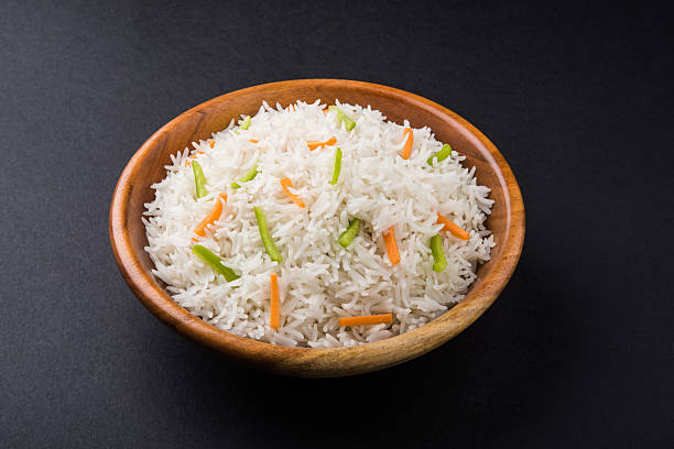 gotowane biały ryżu basmati z marchwi i capsicum polewy - asia asian culture basmati rice bowl zdjęcia i obrazy z banku zdjęć