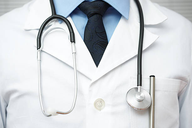 istock front view of doctor with sthetoscope over  uniform 531689950
