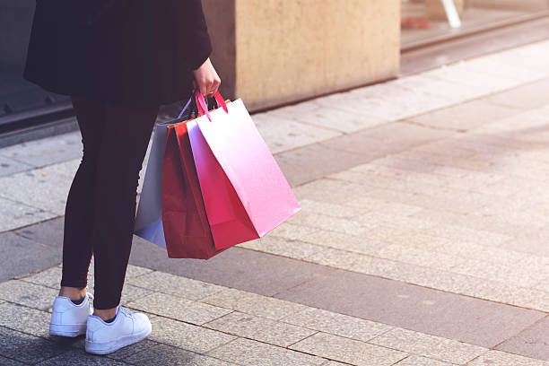 istock Woman's hand holding shopping bags 531690868