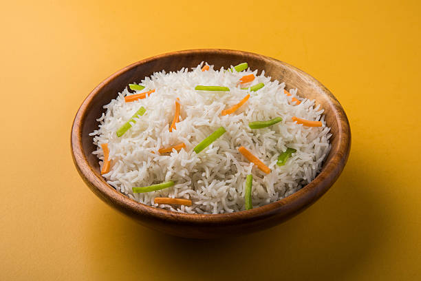 istock cooked white basmati rice with carrot and capsicum toppings 531691094