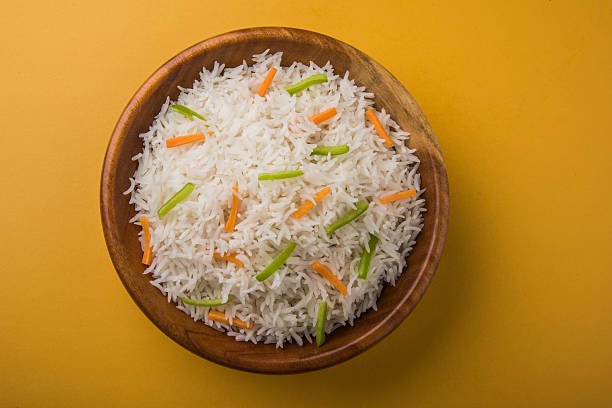 istock cooked white basmati rice with carrot and capsicum toppings 531691760