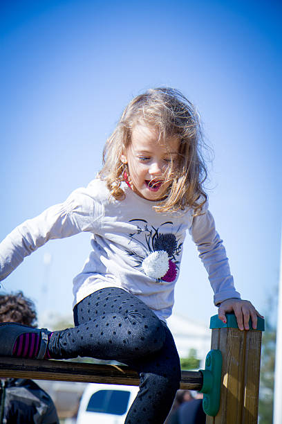 istock girl having fun in the playground 531692192