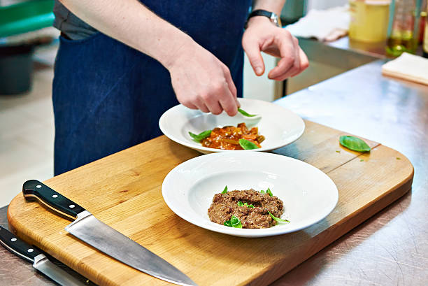 istock Cooking vegetable appetizers and salads in kitchen of restaurant 531692216