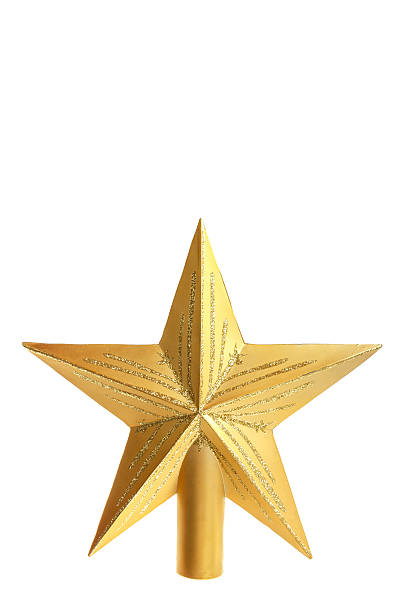 decorative yellow star for top of Christmas tree stock photo
