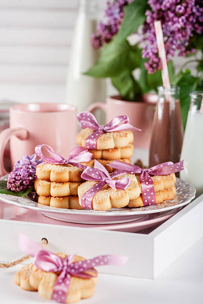 istock Cookies on a white tray with mugs chocolate milkshakes 531692540