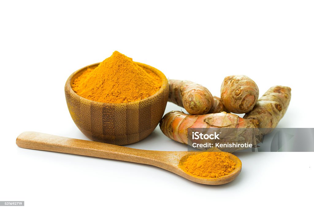 Turmeric and turmeric powder Turmeric and turmeric powder on white background Turmeric Stock Photo