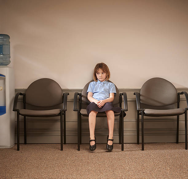 istock waiting outside the head's office 531692806