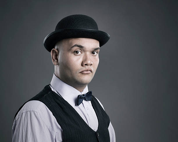 Portrait of bald man with bowler