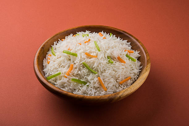 istock cooked white basmati rice with carrot and capsicum toppings 531693750