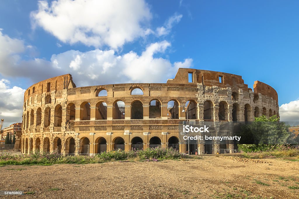 Colosseum Rome Italy The Colosseo, Colosseum, Flavian Amphitheatre, is the largest amphitheater in the world and one of the symbols of Italy. Symbol of Rome, located in historical center, a Unesco Heritage Site. Architectural Column Stock Photo