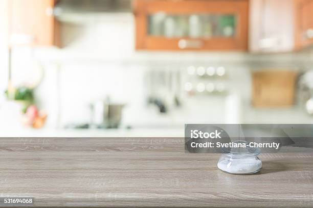 Blurred Background Modern Kitchen With Tabletop And Space For You Stock Photo - Download Image Now