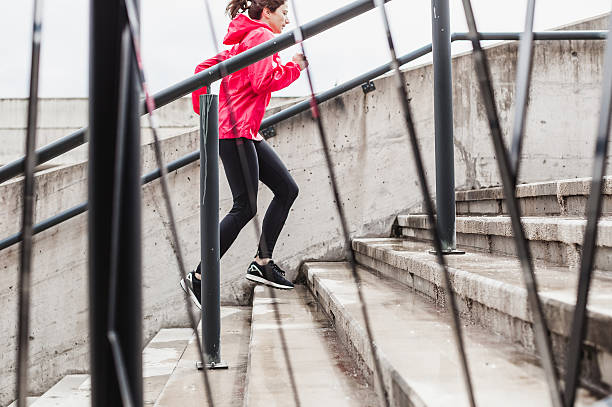 istock Young woman running 531695610