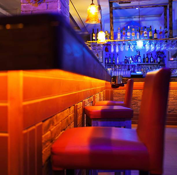 istock Seats in a brightly lit cocktail bar or nightclub 531696110