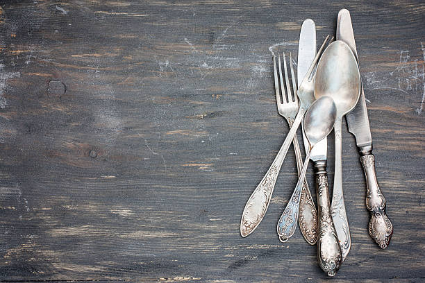 istock Vintage cutlery on an old wooden table, copy space, horizontal 531697028