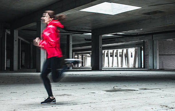 istock Young woman running 531697088