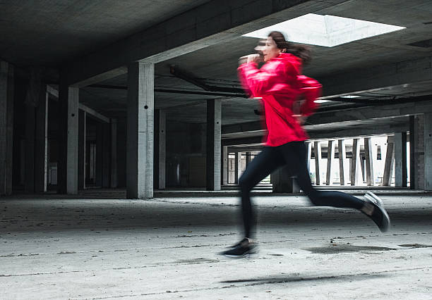 istock Young woman running 531697558