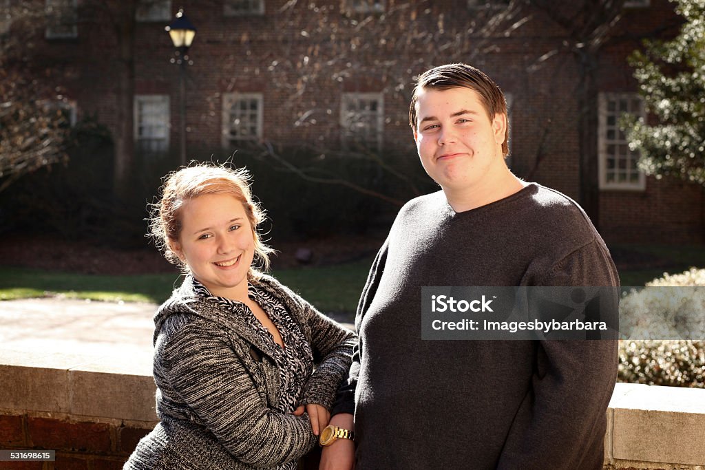 Family Sister posing with her Autistic brother. Autism Stock Photo