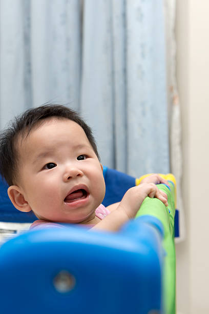 istock Asian baby in playpen 531700126