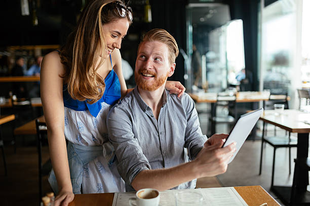 istock Woman and man flirting in cafe 531700756