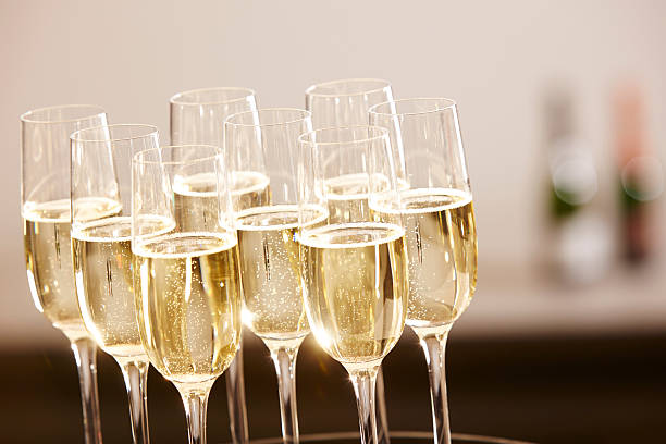istock Glasses full of champagne on a tray 531701762