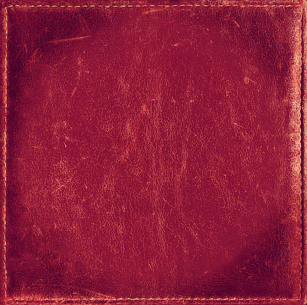 istock Pink grunge background from distress leather texture with stitched frame 531702186