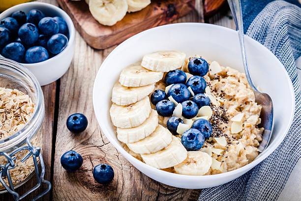 istock Breakfast: oatmeal with bananas, blueberries, chia seeds and almonds 531702208