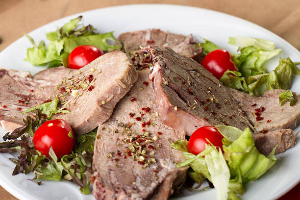 istock Boiled beef tongue ( dil sogus ) on wood background 531703002