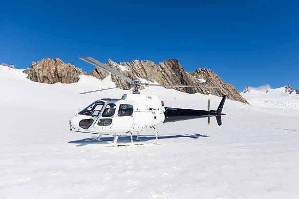 istock helicopter on Franz Josep Glacier 531703478