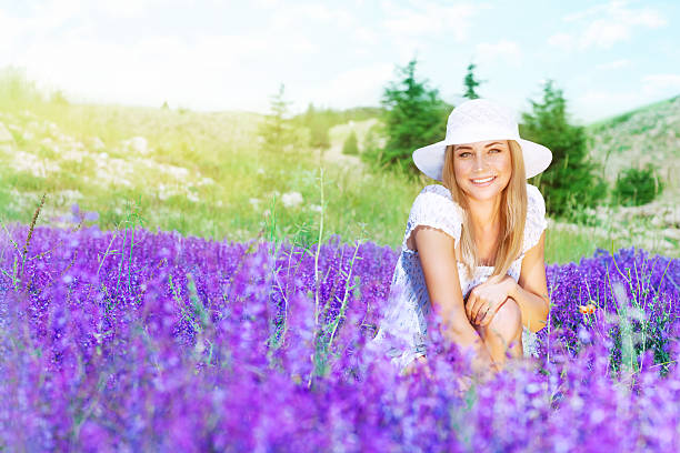 istock Happy woman on lavender field 531704258