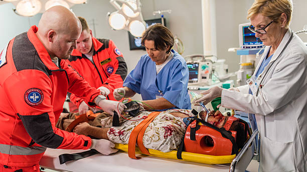 istock Paramedics and doctors in operating theatre 531704566