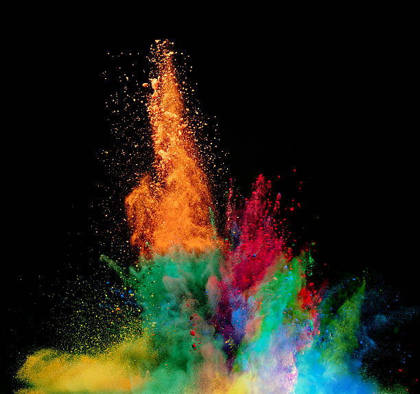istock Explosion of colored powder on black background 531706480