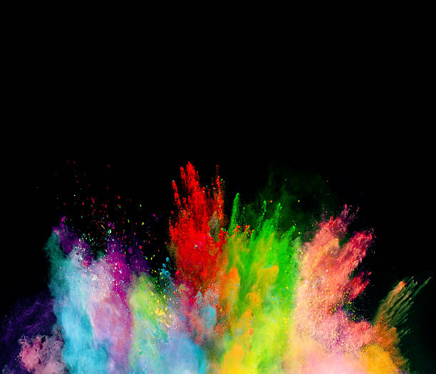istock Explosion of colored powder on black background 531706622