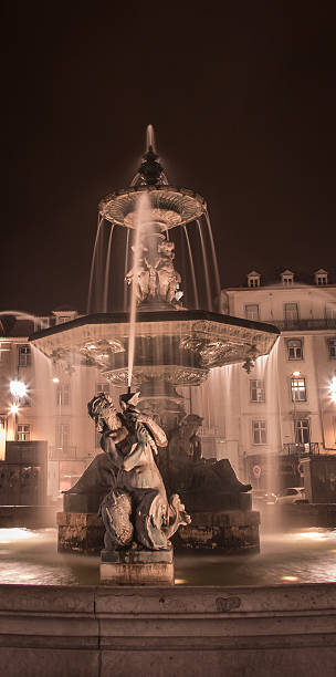 istock fountain lisbon at night 531707386