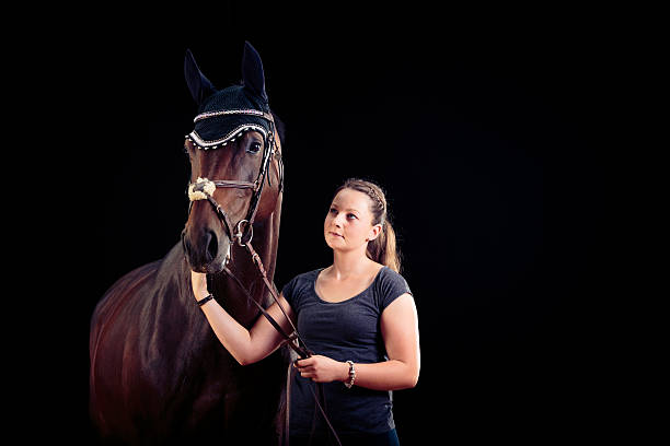 istock Woman With Her Horse 531709538