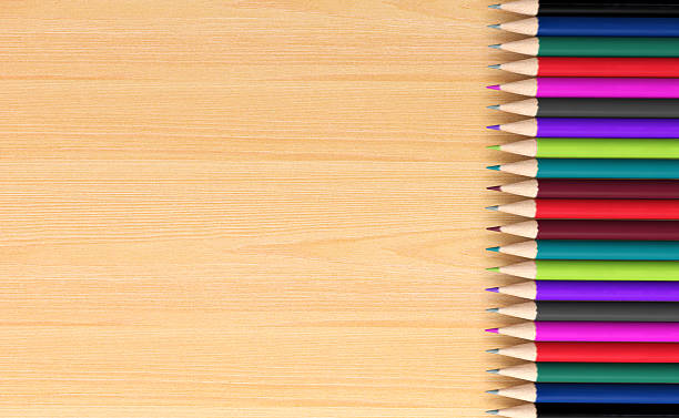 istock Colored pencils on wooden board 531710120