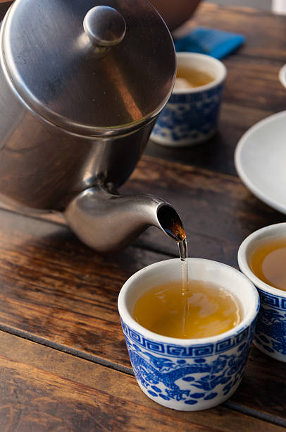 istock Chinese traditional hot tea pouring from kettle 531710580