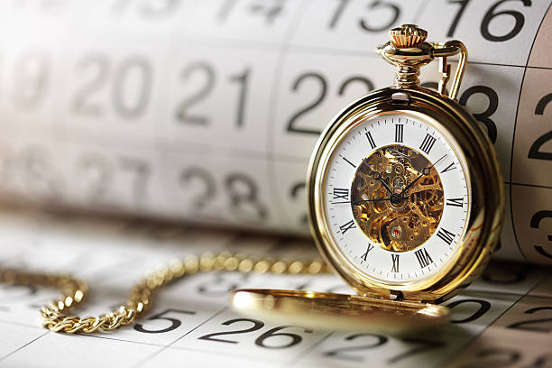 istock Gold pocket watch and calendar 531710731