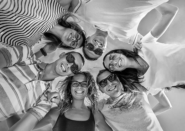 istock Group of friends on the beach under sunlight. 531710778