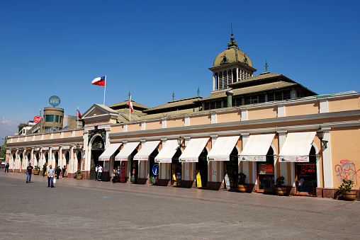 Santiago, Chile - October 17, 2013: Unidentified people walk in front of the Central market of Santiago city on October 17, 2013 in Santiago, Chile.