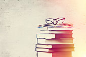 istock books and eyeglasses 531712408