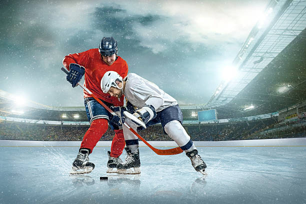 istock Ice hockey player on the ice. Open stadium 531712425