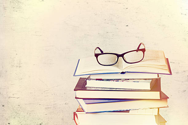 istock books and eyeglasses 531712520