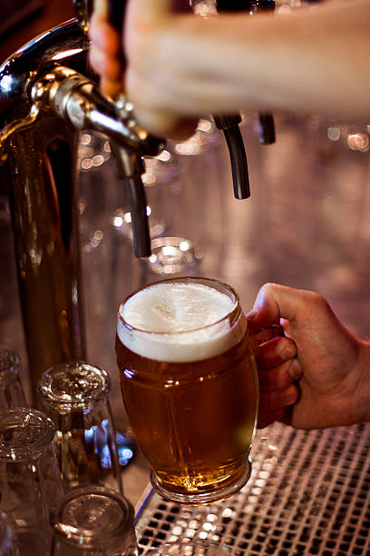 istock Pouring a glass of beer 531712858