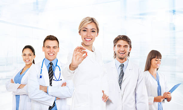 medical team doctor team show pill medical team doctor team happy smile excited, show pill tablet wear white coat with stethoscope, group of people celebrating in hospital capsule medicine photos stock pictures, royalty-free photos & images