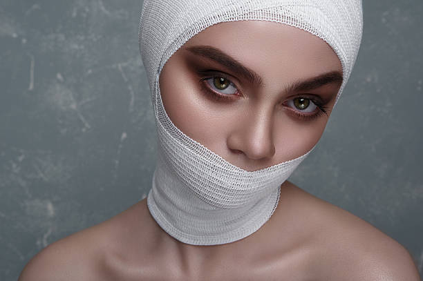 istock Beauty female Model with Bandage on her Face 531713680