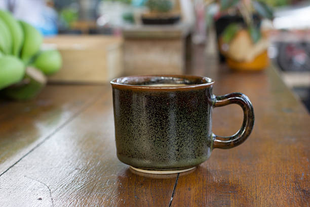 istock Cup of hot coffee , black coffee with foam. 531714252