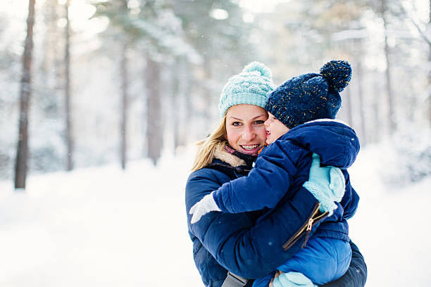 istock Mother and a son on the snow 531714257